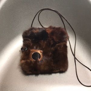 Handmade mink fur crossbody bag.